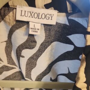 Belted Luxology Black and Cream Jumpsuit...L